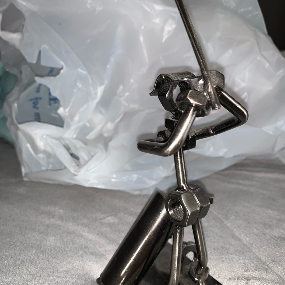 Golfer made from nuts and bolts Art